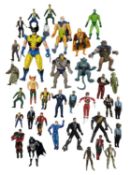 A collection of 1980s/1990s popular culture action figures from various franchises to include: - X-