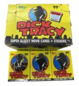 A retail box containing 24 sealed blind packs of Dick Tracy movie cards and stickers, by Topps