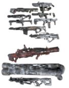 A large collection of large custom painted prop Science Fiction themed larger weapons consisting