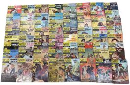 A quantity of various UK and US vintage Classics Illustrated comic books.