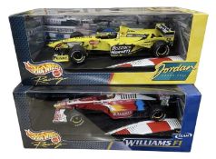 A pair of boxed Hotwheels 1:18 scale model racing cars, to include: - Williams F1, Ralf Schumacher -