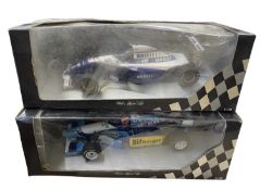 A pair of boxed Paul's Model Art 1:18 scale model racing cars, to include: - Williams Renault