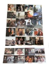 A collection of various full colour Thriller/Horror film lobby cards