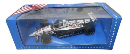 A boxed Minichamps 1:18 scale model racing car, Indy Car Collection, Carl Haas / Paul Newman