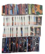 Four complete sets of trading cards, to include - WCW, 1992 x2 - The Lion King, 1994 - Batman and