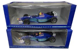 A pair of 1:18 scale boxed Onyx racing cars, to include: - Sauber Petronas C16 Johnny Herbert 1997 -