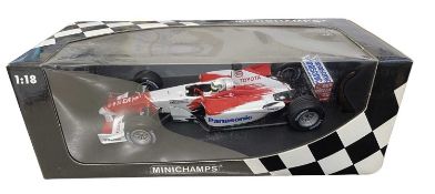 A boxed Minichamps 1:18 scale model racing car, Panasonic Toyota Racing, TF102, A McNish