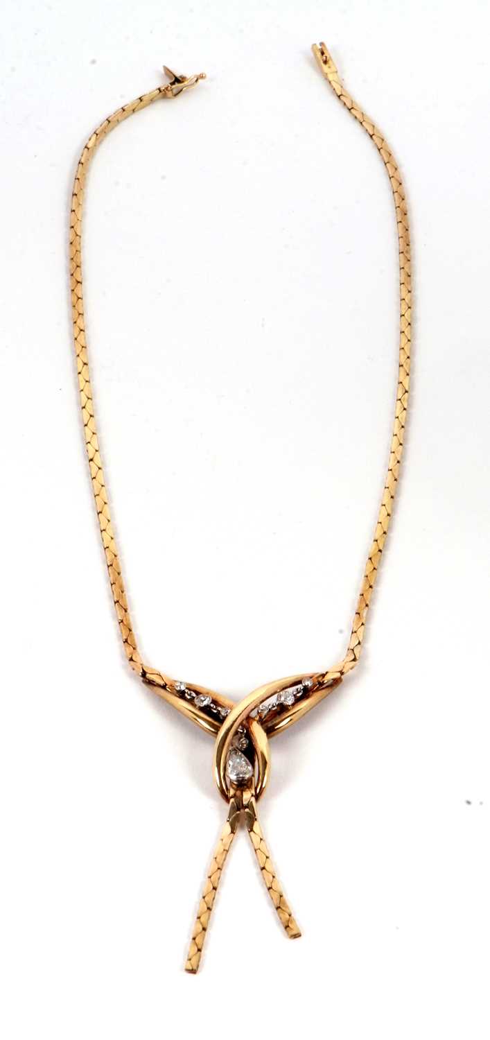 A 9ct diamond necklace, set to centre with crossover loop of gold set with a pear shape and a - Image 6 of 9