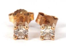 A pair of 9k diamond studs, the round brilliant cut diamonds, each estimated approx. 0.16cts, (total