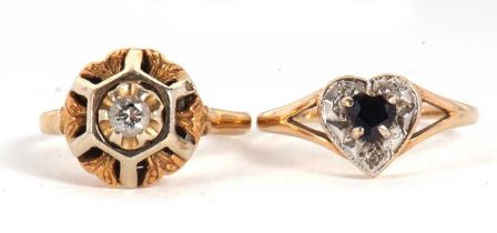Two gemset rings, the first with a central round brilliant cut diamond, claw set within a raised