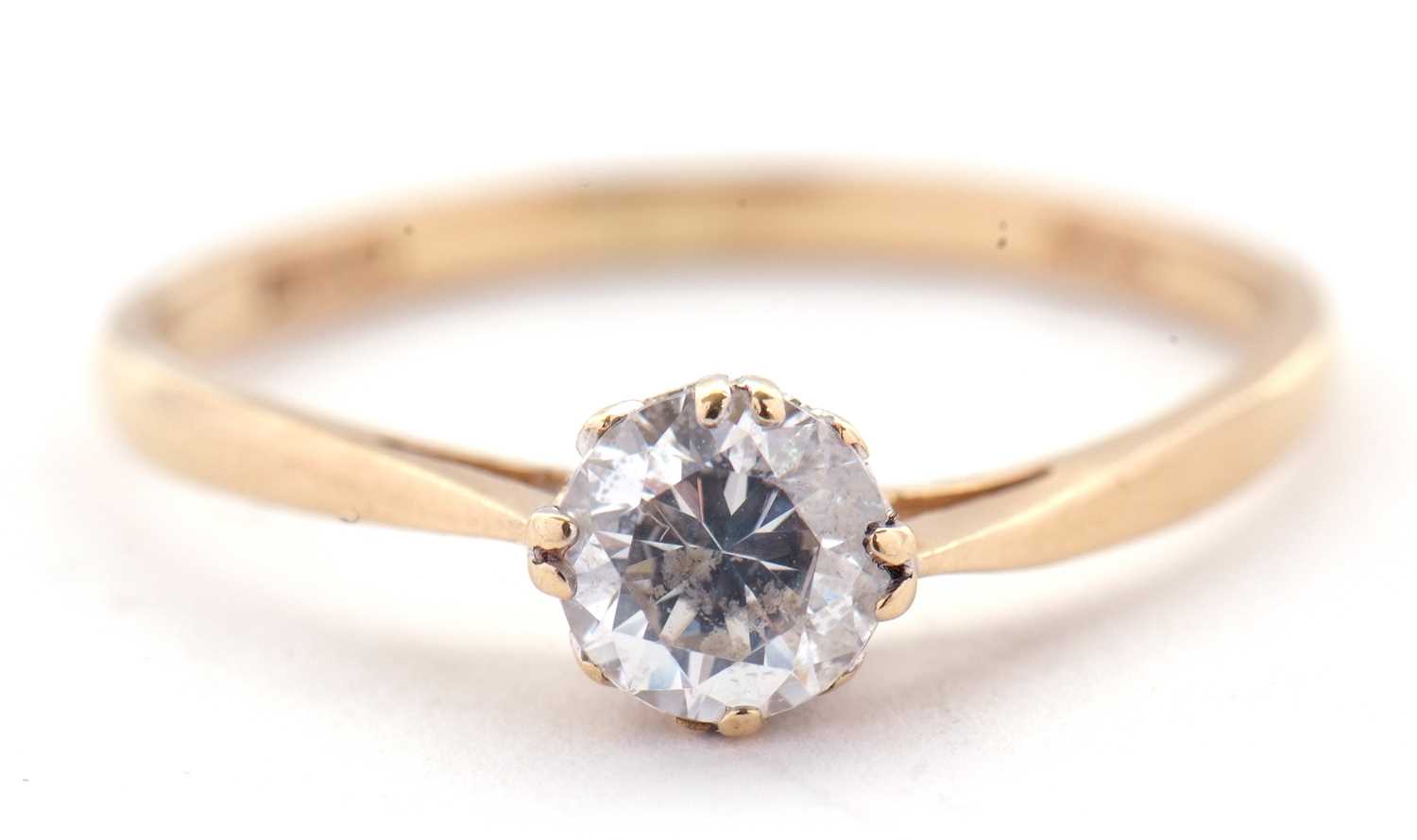 A 14ct CZ ring, the round white CZ claw mounted to a plain band stamped 585 with London assay - Image 2 of 6