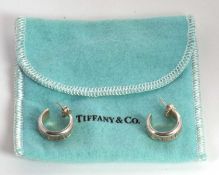 A pair of Tiffany silver Atlas earrings, 6mm wide, stamped 'Atlas ©2003 Tiffany & Co 925', 7.0g