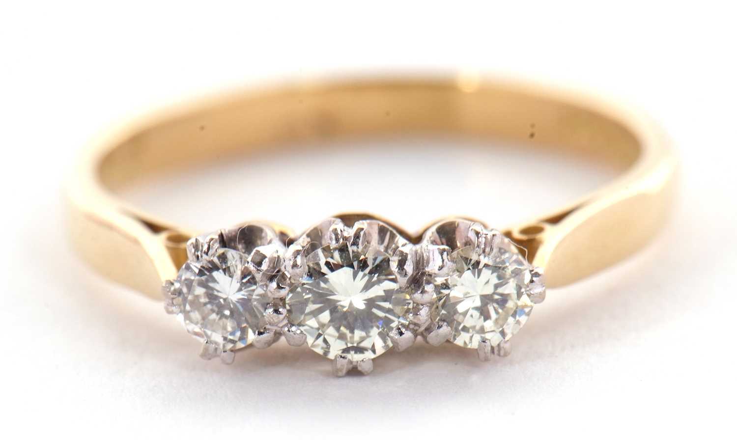 A three stone diamond ring, the three round brilliant cut diamonds, estimated approx. 0.42cts, all - Image 2 of 8