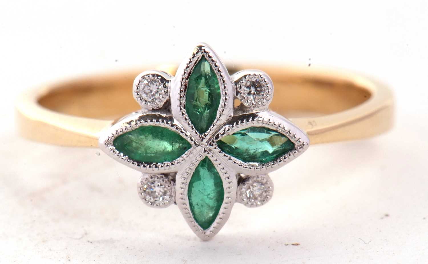 An 18ct emerald and diamond ring, the four marquise shape emeralds interspaced with small round - Image 6 of 6