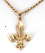 A fleur de lys gold necklace, the fleur de lys pendant and tapered bale, both stamped 14k, 3.9g,