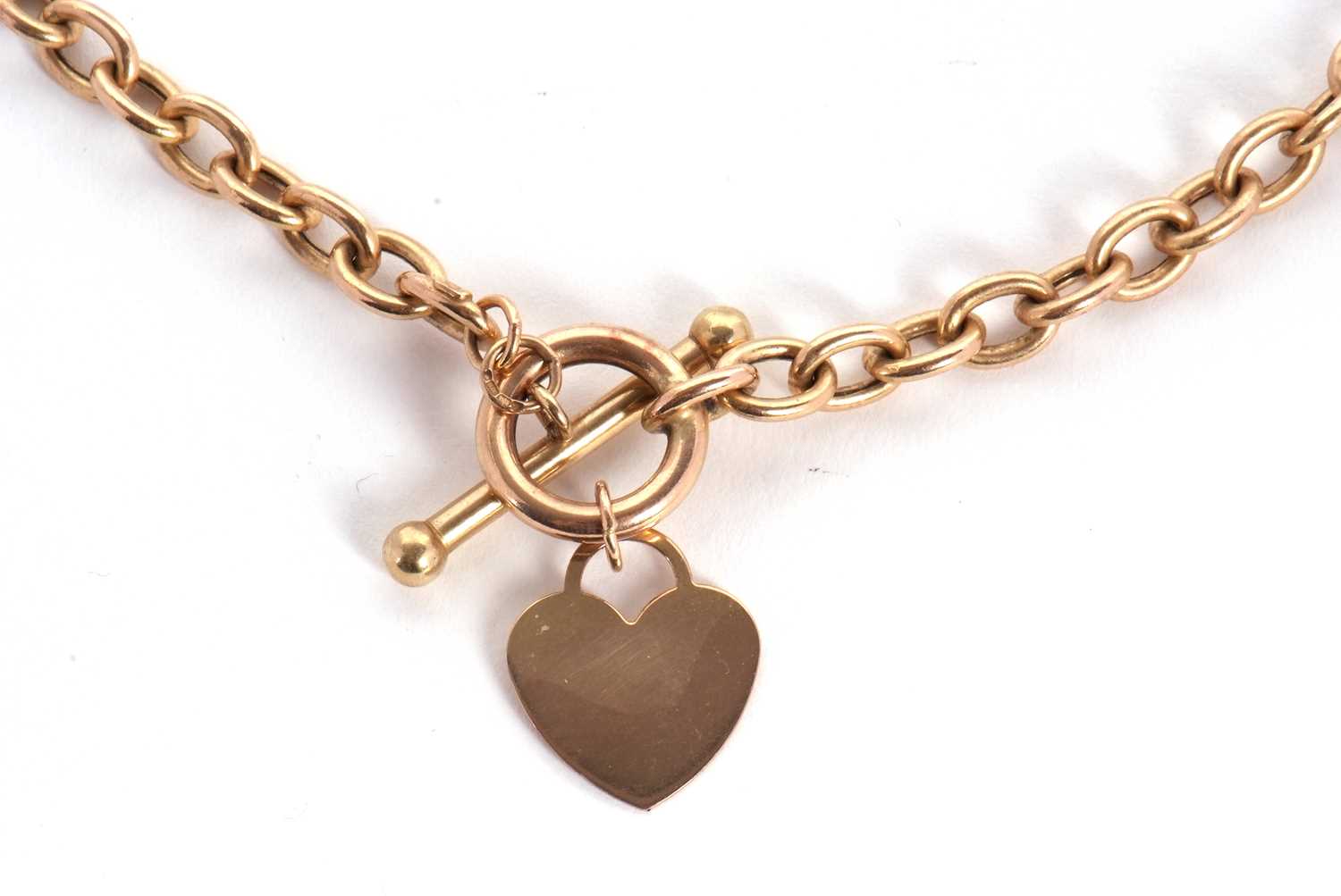 A belcher link necklace with heart shape charm, the necklace with integrated tag stamped 375, jump - Image 2 of 3