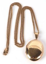 A 9ct locket and 9ct chain, the oval locket with personal inscription, hallmarked Birmingham 1997,