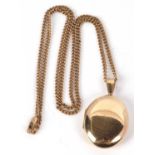 A 9ct locket and 9ct chain, the oval locket with personal inscription, hallmarked Birmingham 1997,