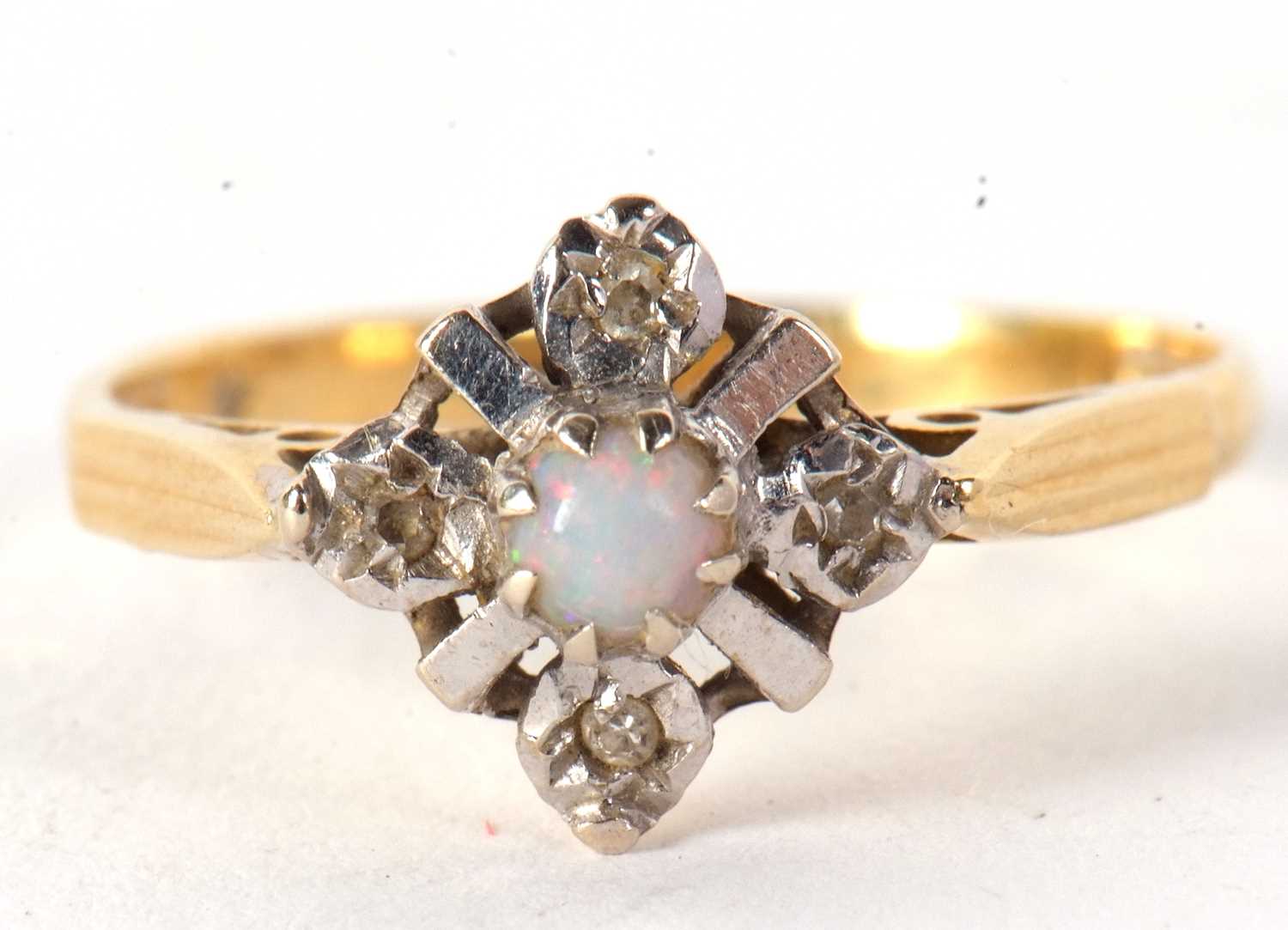 An 18ct opal and diamond ring, the central round opal cabochon set with four small round diamonds, - Image 6 of 7