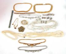 A mixed lot of costume jewellery, mostly mid-20th century, to include a paste set covered cocktail