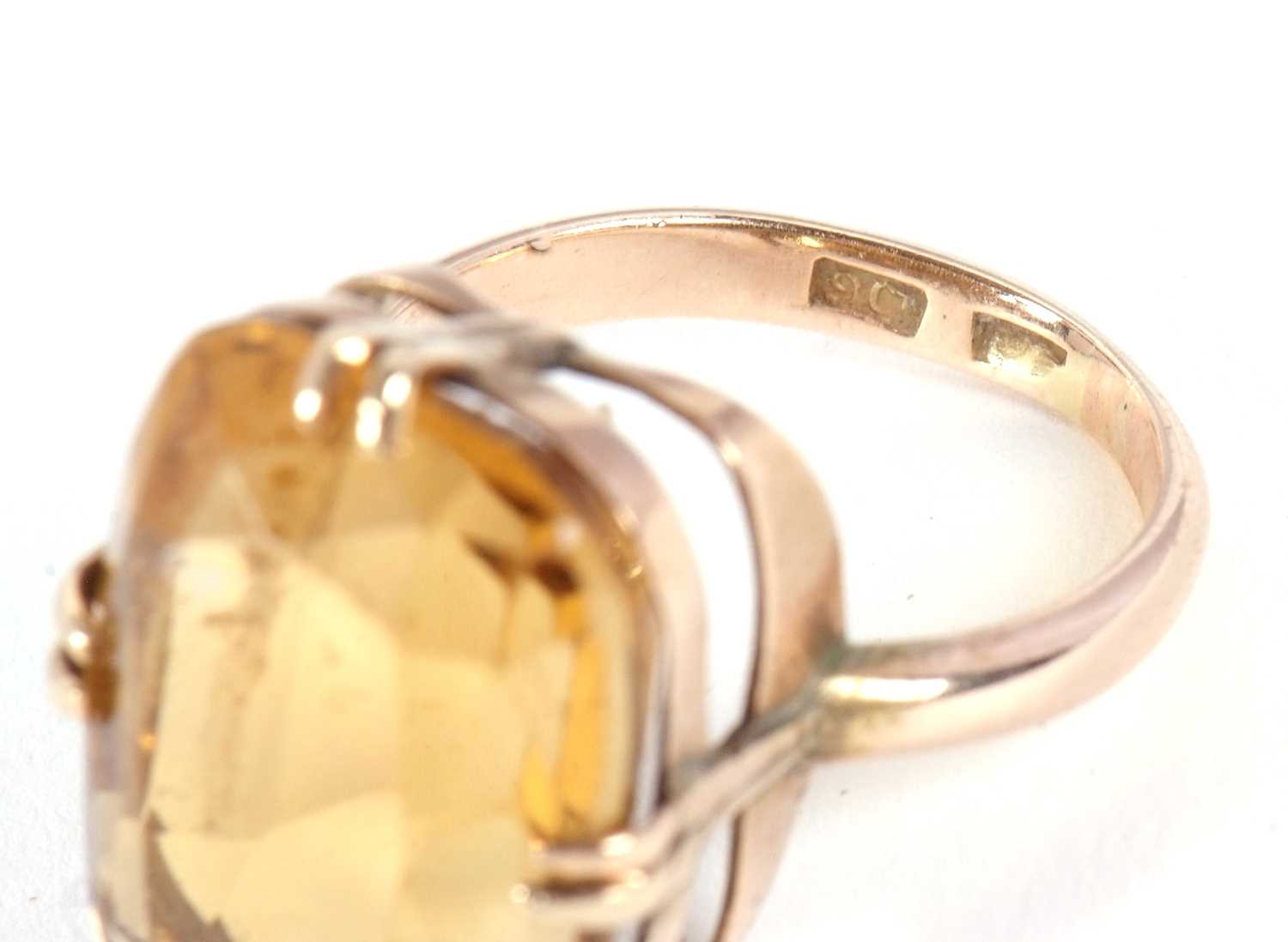 A 9ct citrine ring, the oval mixed cut citrine, approx. 19mm long, in four double claw mount with - Image 4 of 6