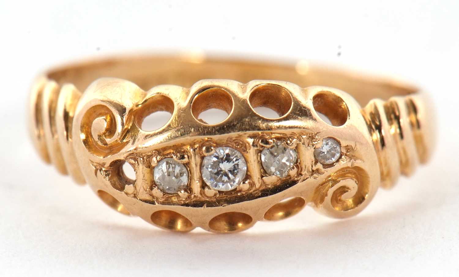 A diamond ring, set with small round diamonds (one missing), with pierced gallery and ridged - Image 7 of 7