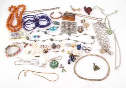 A quantity of assorted costume jewellery, to include bangles, brooches, beads, rings, chains, etc.