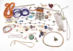 A quantity of assorted costume jewellery, to include bangles, brooches, beads, rings, chains, etc.