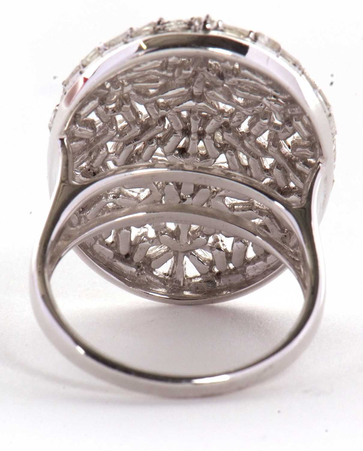 A diamond plaque ring, the oval plaque set with a mix of tapered baguette cut diamonds, totalling - Image 6 of 7