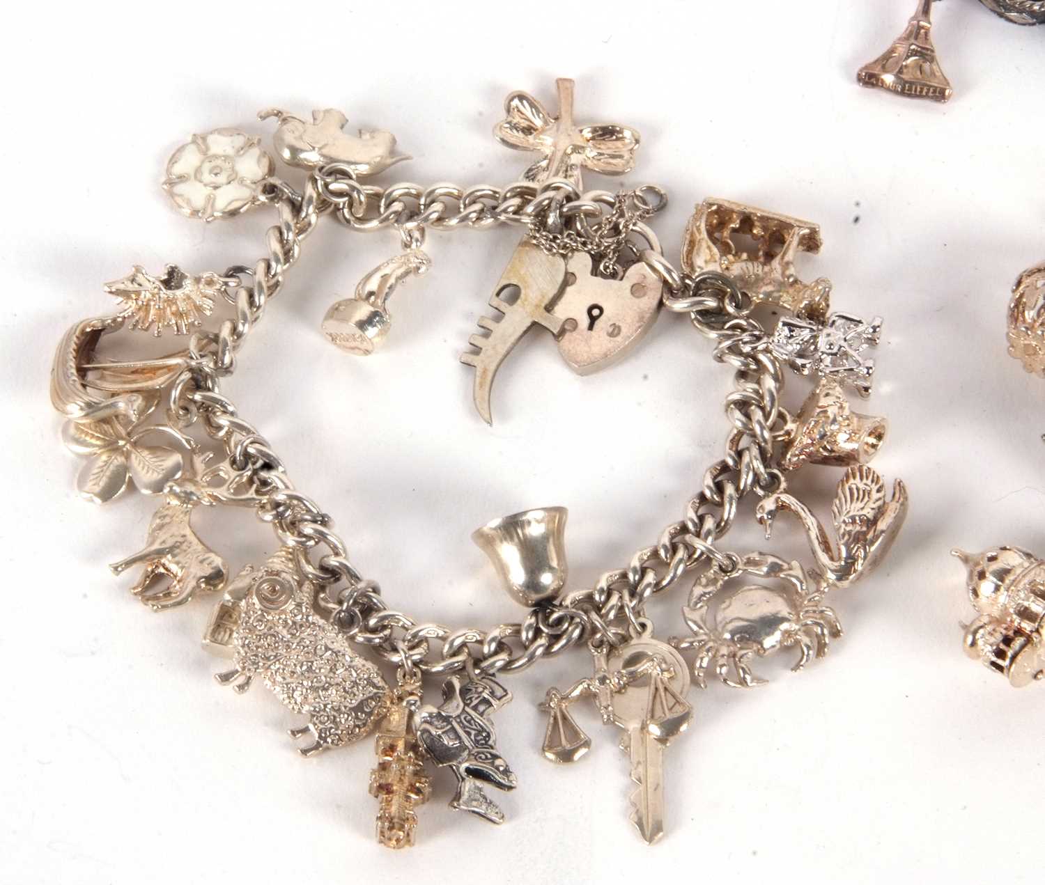 Two silver charm bracelets, both with curblink bracelets and heart shaped padlock clasps, one - Image 4 of 5