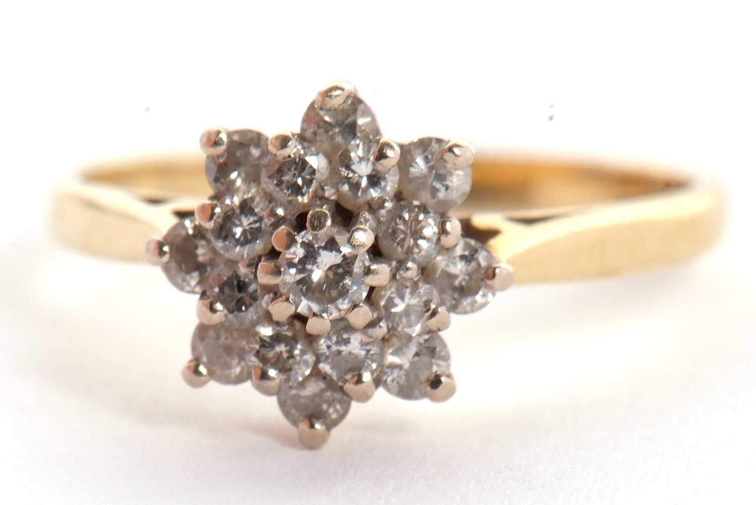 An 18ct diamond cluster ring, the central round brilliant cut diamond surrounded by a further 8 - Image 2 of 6