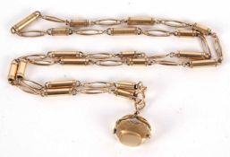 A 9ct chain and 9ct citrine fob, the fancy link chain stamped 375 to each end and hallmarked