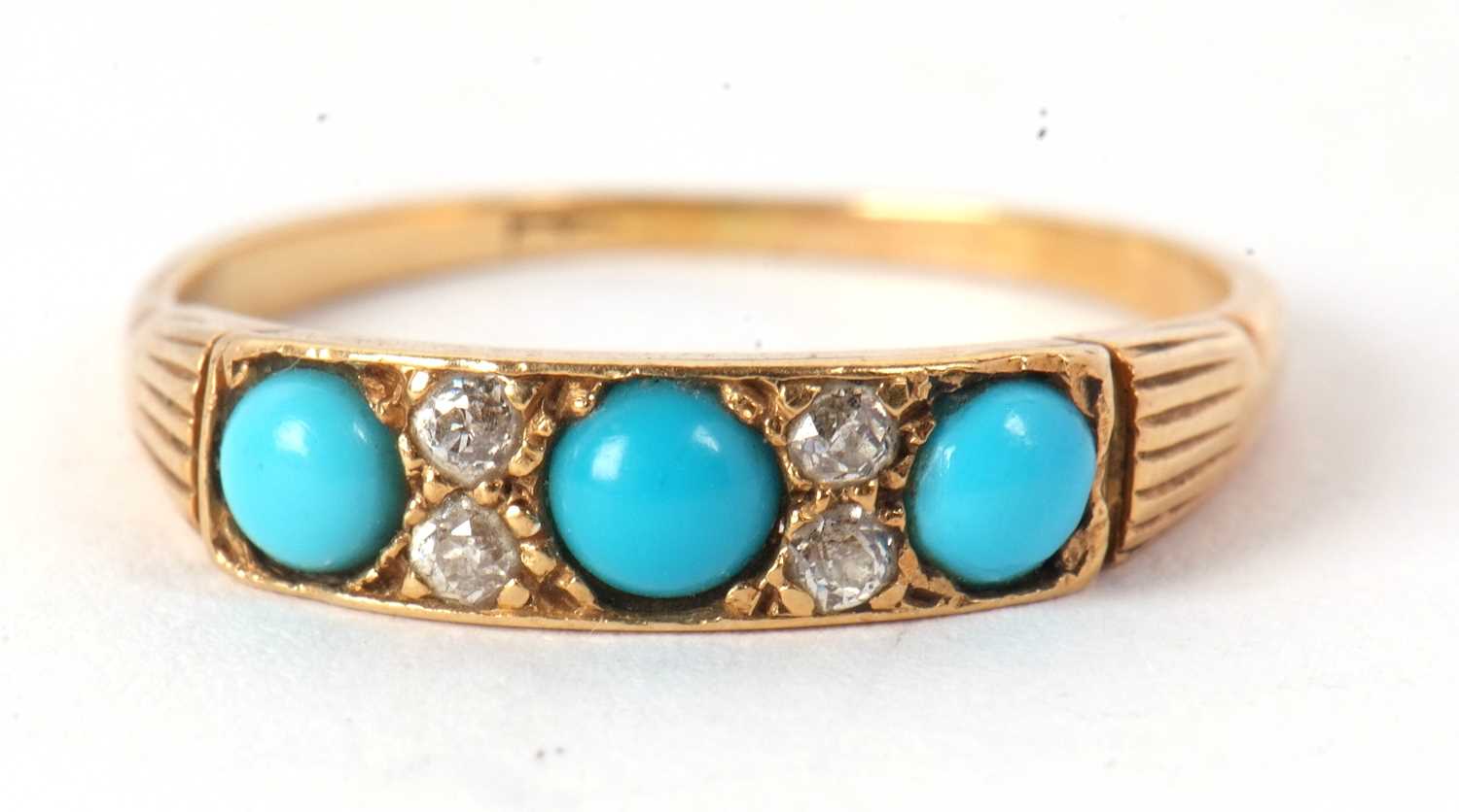 A turquoise and diamond ring and faux turquoise earrings, the ring set with three round turquoise - Image 4 of 8