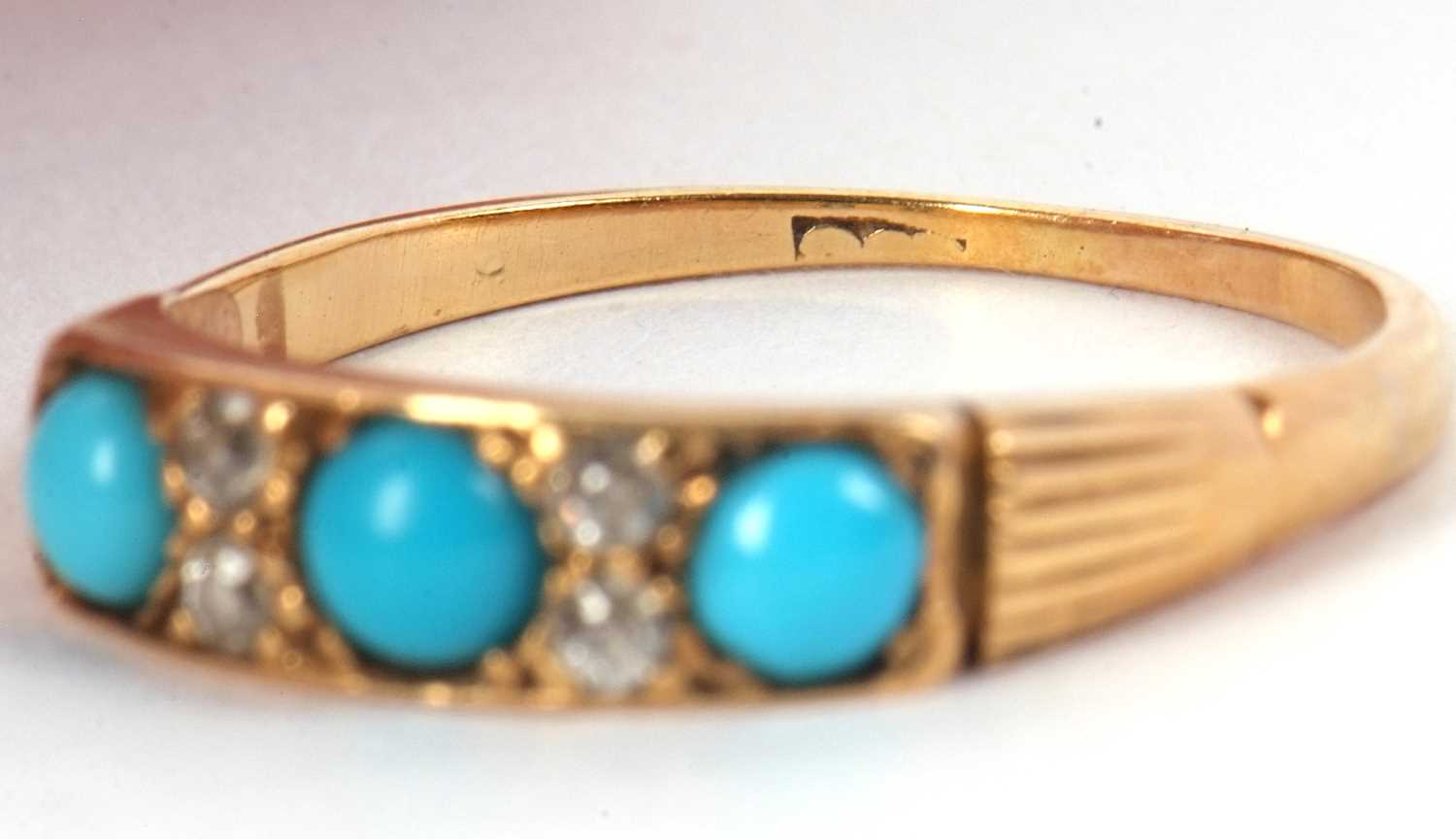 A turquoise and diamond ring and faux turquoise earrings, the ring set with three round turquoise - Image 7 of 8