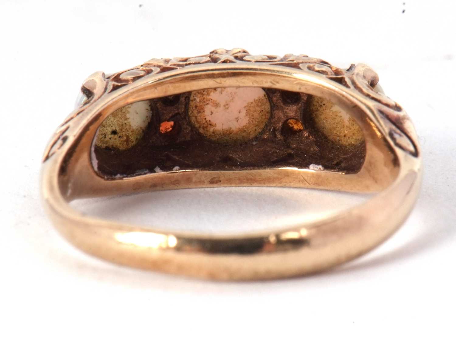 A 9ct opal and garnet ring, the three slightly graudated round opal cabochons, interspaced with - Image 6 of 7