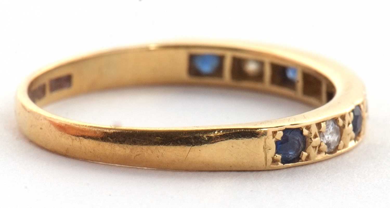 An 18ct sapphire and diamond ring, the half hoop ring set with alternating round sapphires and - Image 3 of 5
