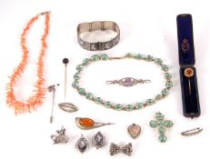A mixed lot of jewellery to include a garnet set stick pin, cased, a banded agate stick pin, an