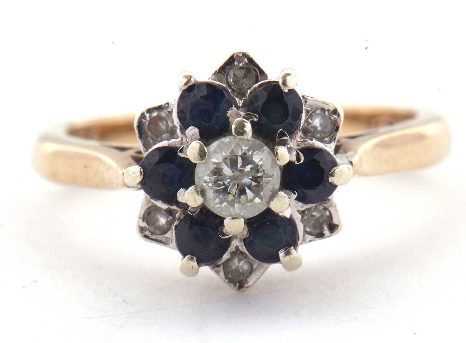 A 9ct sapphire and diamond cluster ring, the central round brilliant cut diamond surrounded by small - Image 6 of 7