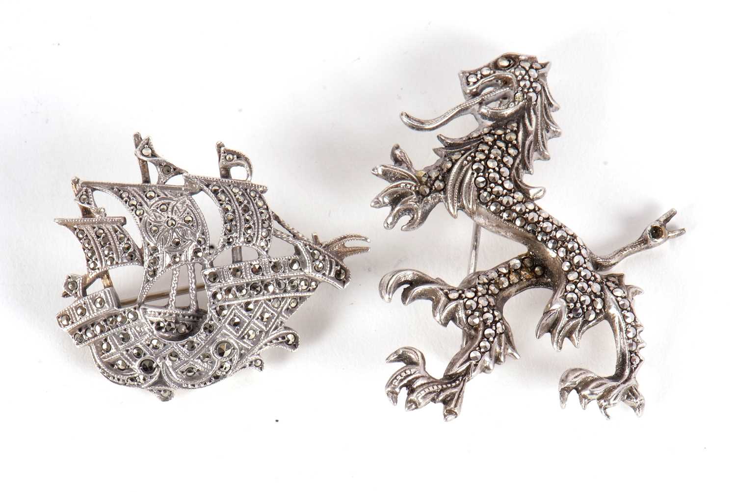 Two continental silver marcasite brooches, one of a galleon stamped 935, 38mm wide, the other of a - Image 3 of 3