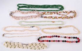 A quantity of cultured pearl and hardstone bead necklaces