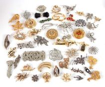 A quantity of mid 20th century and later brooches, to include Trifari, marcasite, animal brooches,