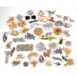 A quantity of mid 20th century and later brooches, to include Trifari, marcasite, animal brooches,