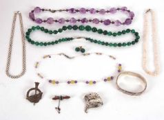 A mixed lot of jewellery to include a graduated malachite bead necklace and earrings, an amethyst