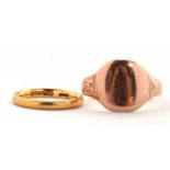 Two gold rings, to include an 22ct wedding band, hallmarked London 1953, size J, 3.1g, and a rose