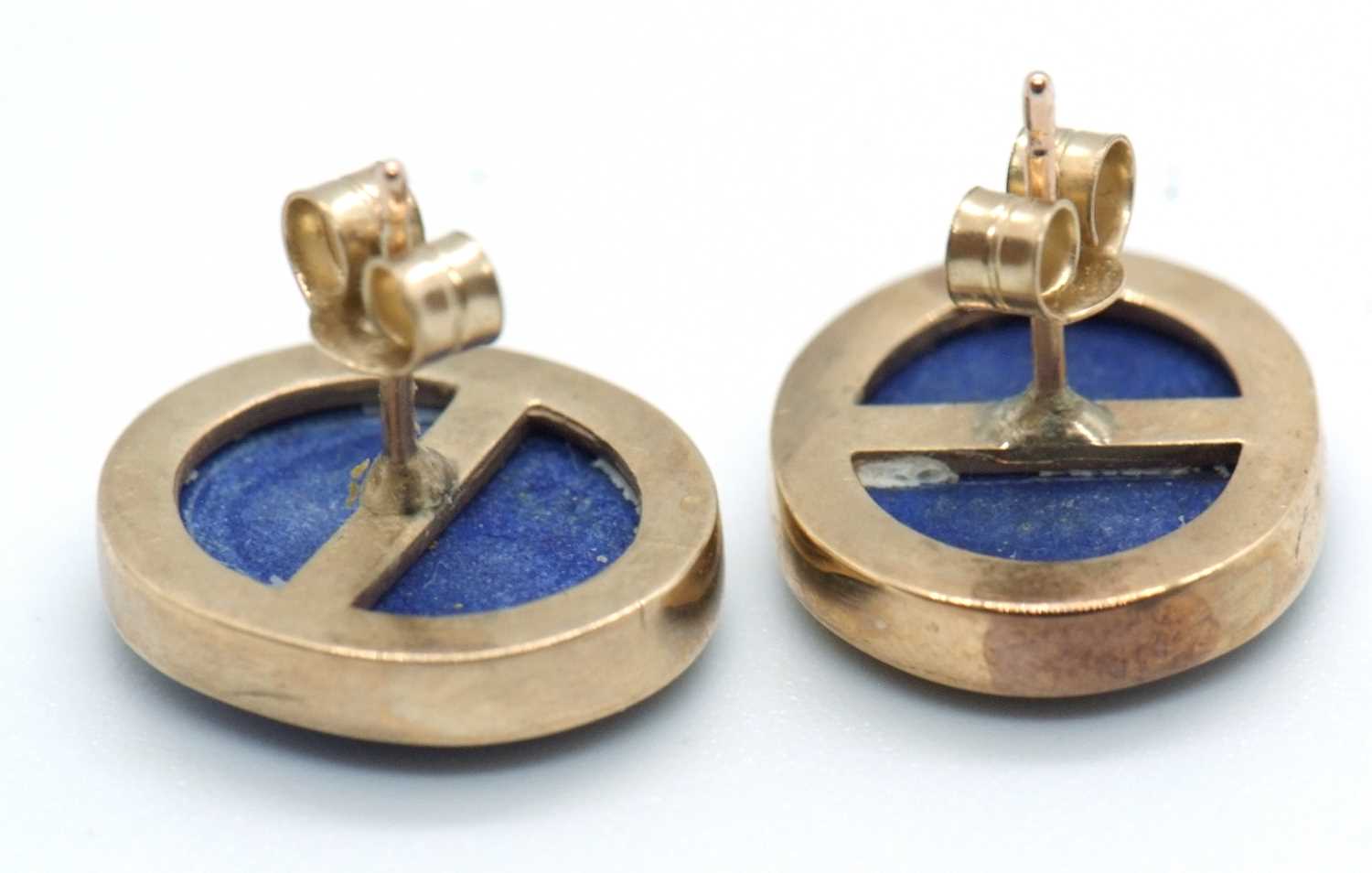 A pair of lapis lazuli earstuds, the oval discs of lapis lazuli in collet mounts and posts for - Image 2 of 2