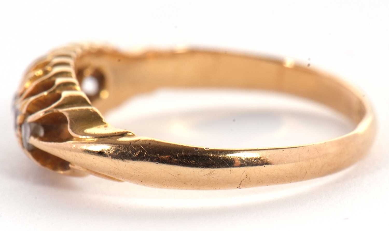 An 18ct diamond ring, the five old mine cut diamonds, all claw mounted to a plain band of yellow - Image 3 of 5