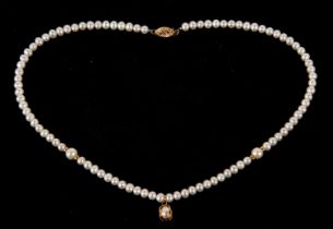 A cultured pearl necklace, the off round cultured pearls, approx. 4.5mm diameter, with a larger