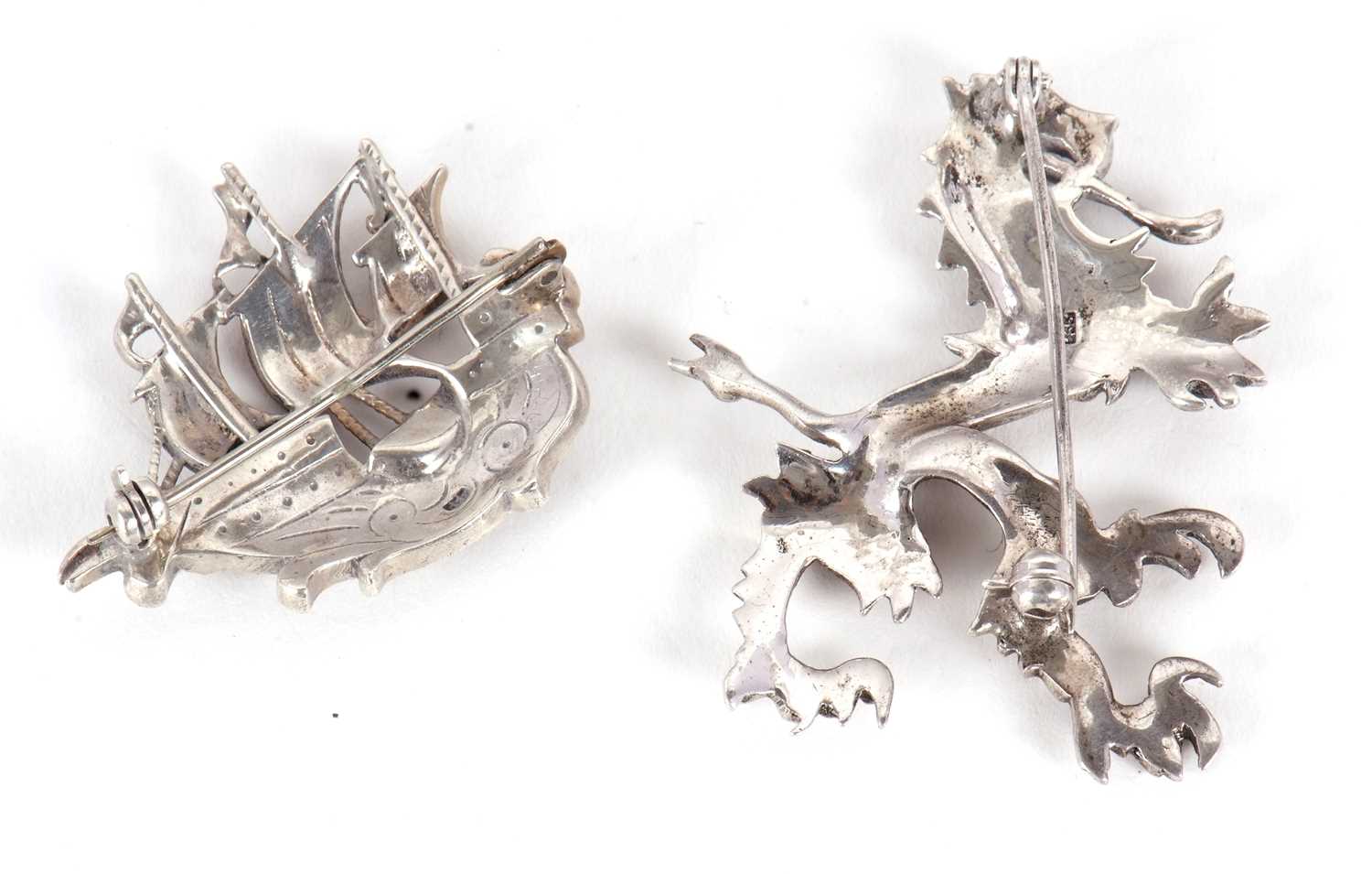 Two continental silver marcasite brooches, one of a galleon stamped 935, 38mm wide, the other of a - Image 2 of 3