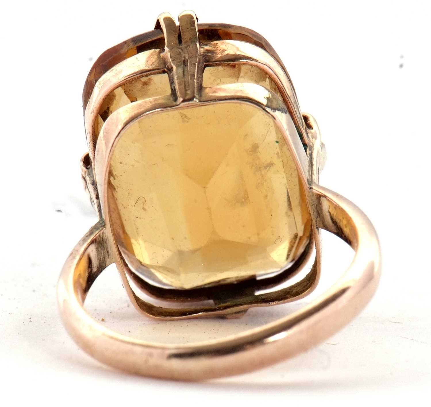 A 9ct citrine ring, the oval mixed cut citrine, approx. 19mm long, in four double claw mount with - Image 5 of 6