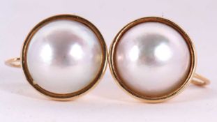 A pair of cultured mabe pearl earrings, the round cultured mabe pearls in rubover mounts, approx.